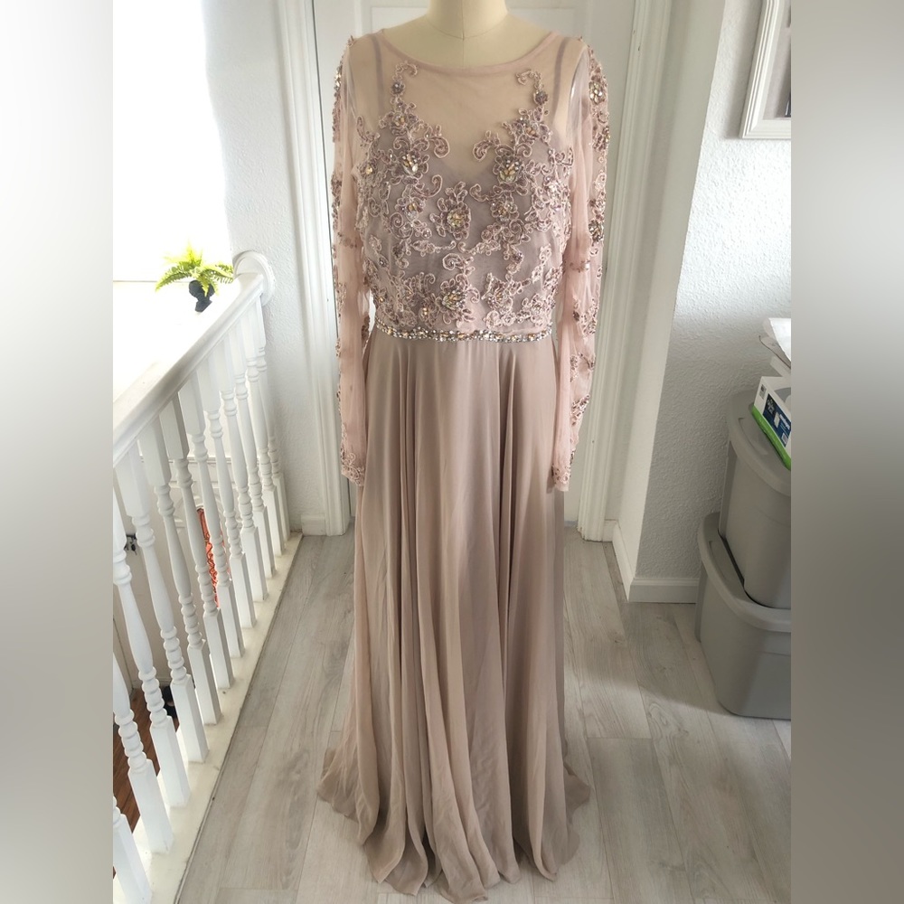 Long Sleeves beaded gown.